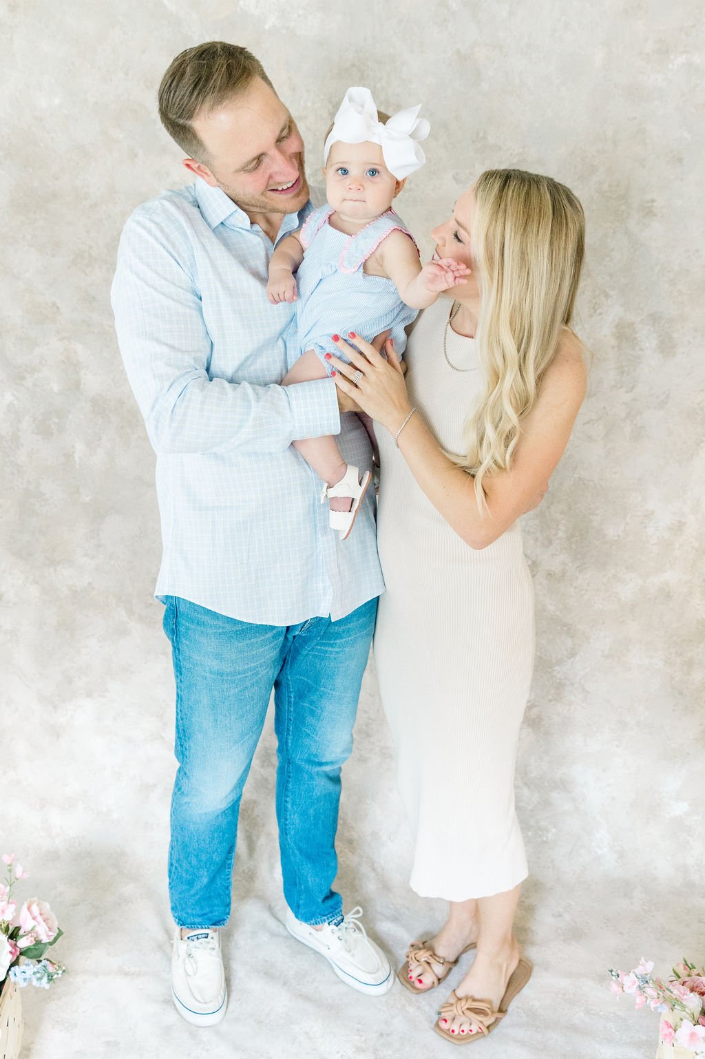 in home family session with canvas paint backdrop